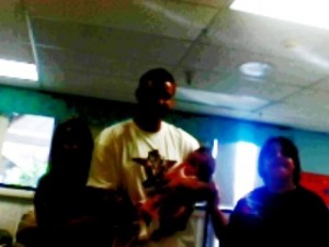 Kurt Warner holding Mandy