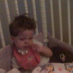 Mandy sitting up in her crib for the frist time!